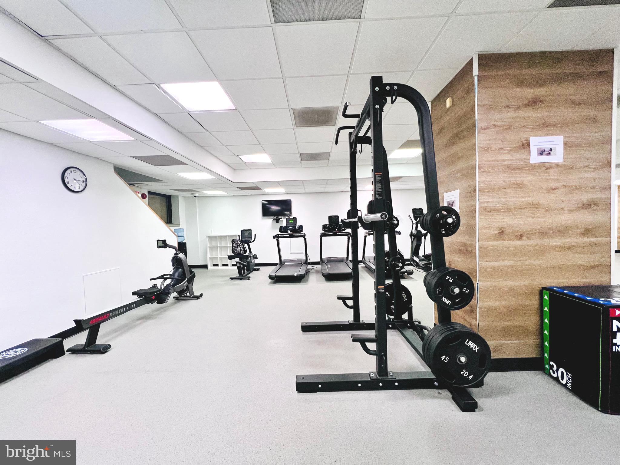 2111 Wisconsin Avenue Northwest, Unit 110 Washington, DC 20007 - Photo 22 of 32 a view of a room with gym equipment