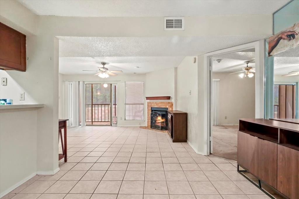 11460 Audelia Road, Unit 172 Dallas, TX 75243 - Photo 6 of 38 a large white kitchen with cabinets and furniture