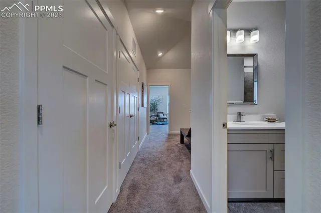 a view of a hallway with front door