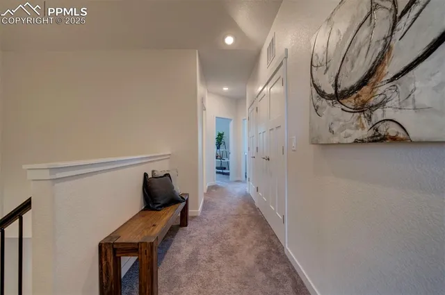 a view of a hallway to the house