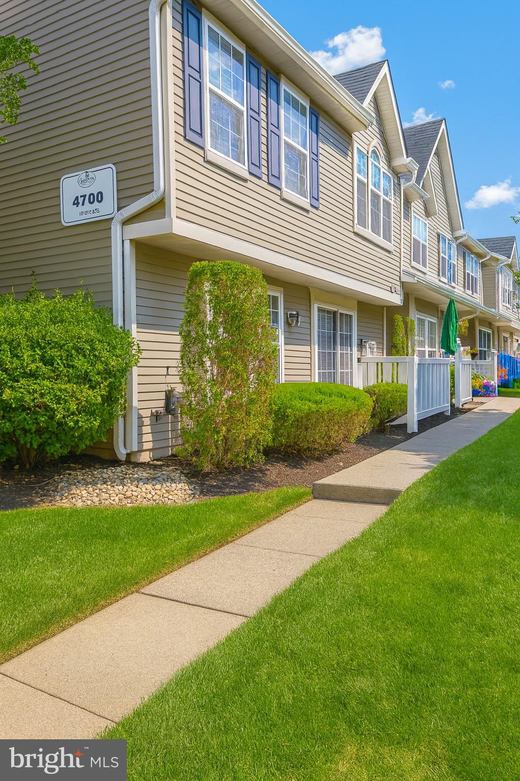 4705 Grenwich Lane Mount Laurel, NJ 08054 - Photo 1 of 12 a front view of a house with garden