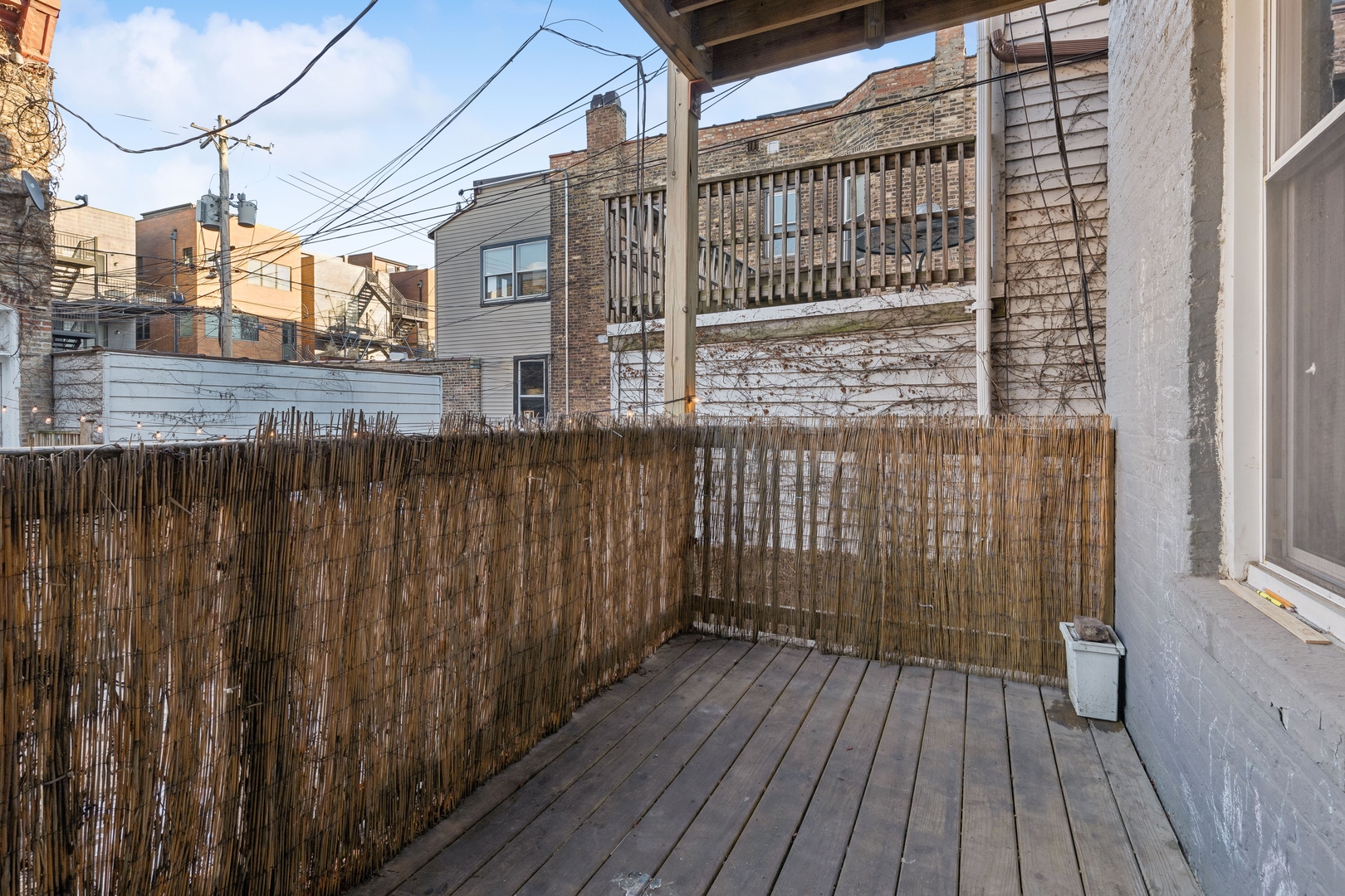 949 North Damen Avenue Chicago, IL 60622 - Photo 19 of 28 a view of a balcony with wooden floor