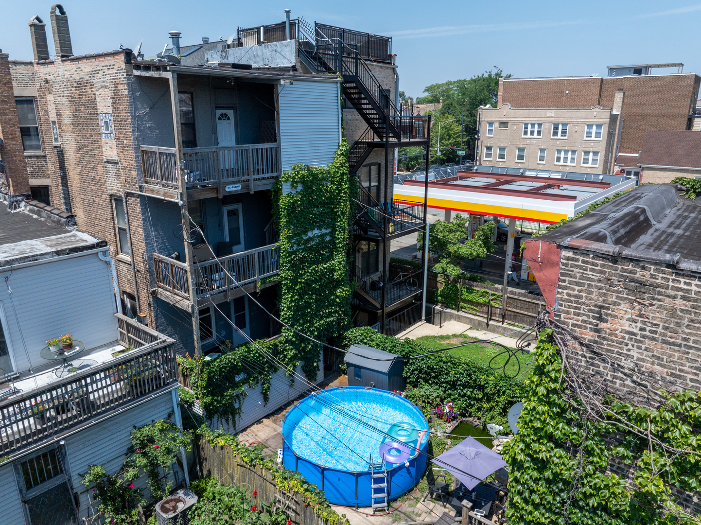 949 North Damen Avenue Chicago, IL 60622 - Photo 28 of 28 a view of a swimming pool with a patio and plants