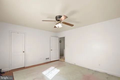 a bathroom with a sink a mirror and a shower