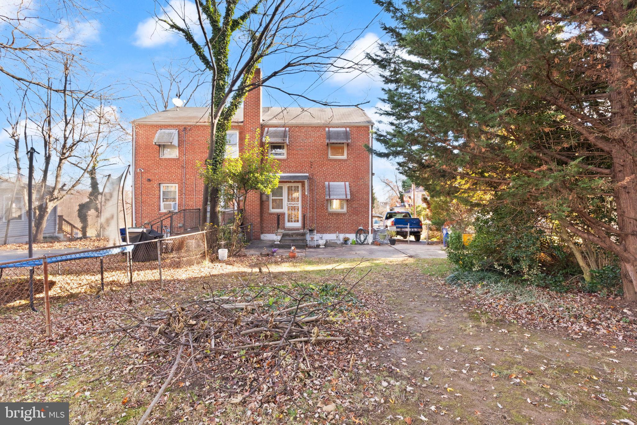 6822 Everall Avenue Baltimore, MD 21206 - Photo 21 of 21 a view of a building with a yard