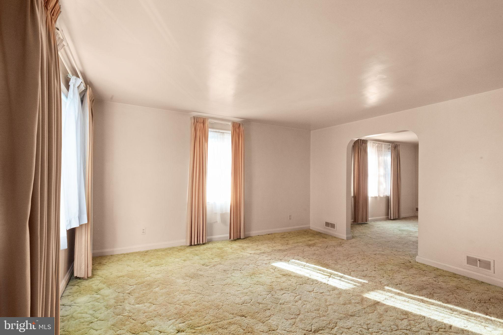 6822 Everall Avenue Baltimore, MD 21206 - Photo 5 of 21 a view of an empty room and window
