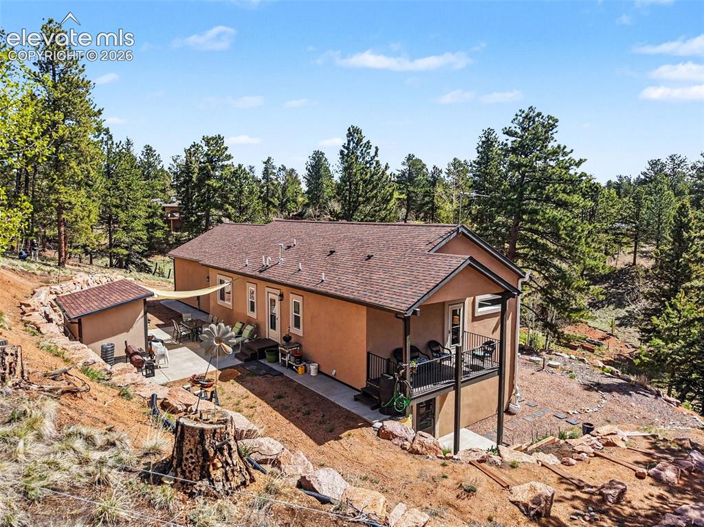 45 Valley Circle Divide, CO 80814 - Photo 3 of 42 a aerial view of a house with a yard and sitting area
