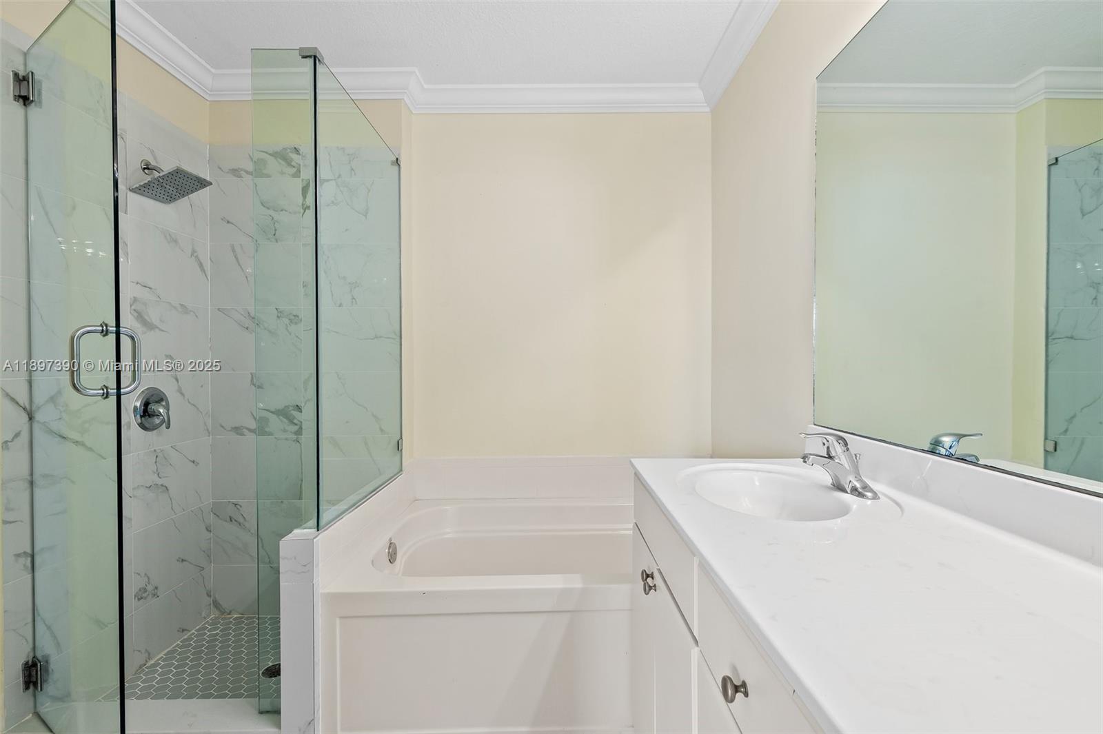 12421 Southwest 50th Court, Unit 347 Miramar, FL 33027 - Photo 6 of 25 a bathroom with a sink toilet and shower