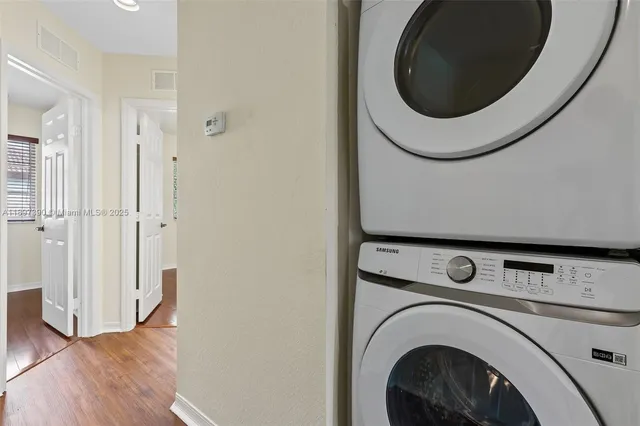 a view of washer and dryer in a utility room