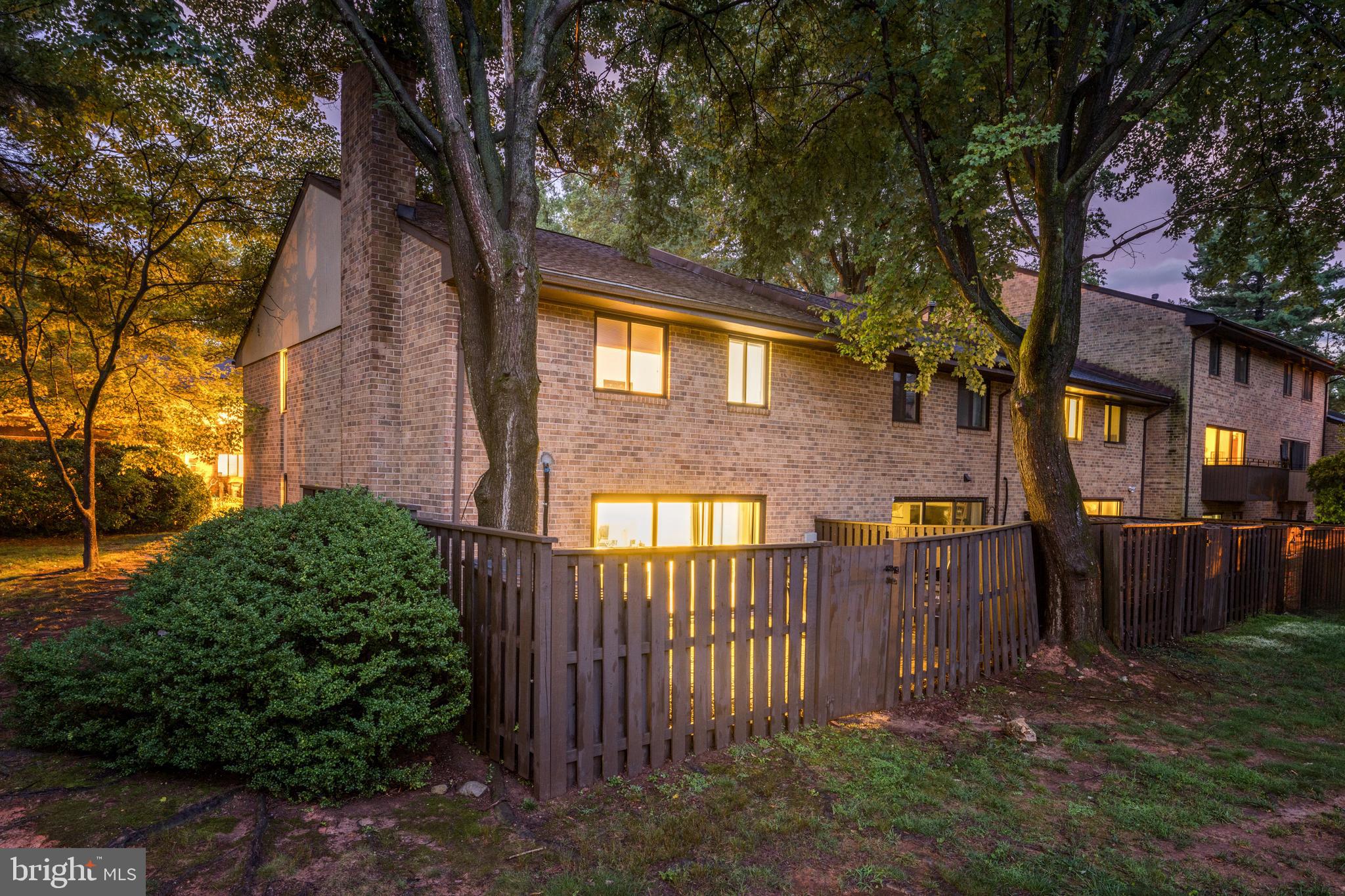 11102 Saffold Way Reston, VA 20190 - Photo 1 of 27 a front view of a house with a yard