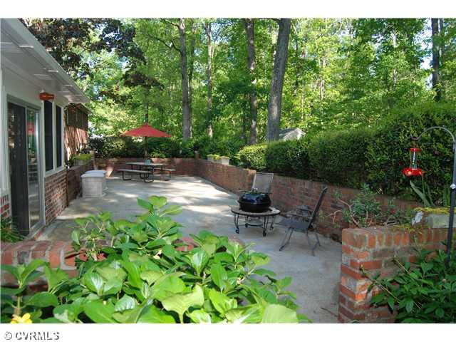 3919 Cresthill Road Chester, VA 23831 - Photo 7 of 7 Patio/Deck - Paved patio great to entertain your friends & family. Sit by the fire pit or enjoy barbecuing your meals out on the grill