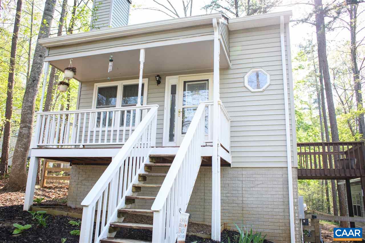a view of a house with a deck