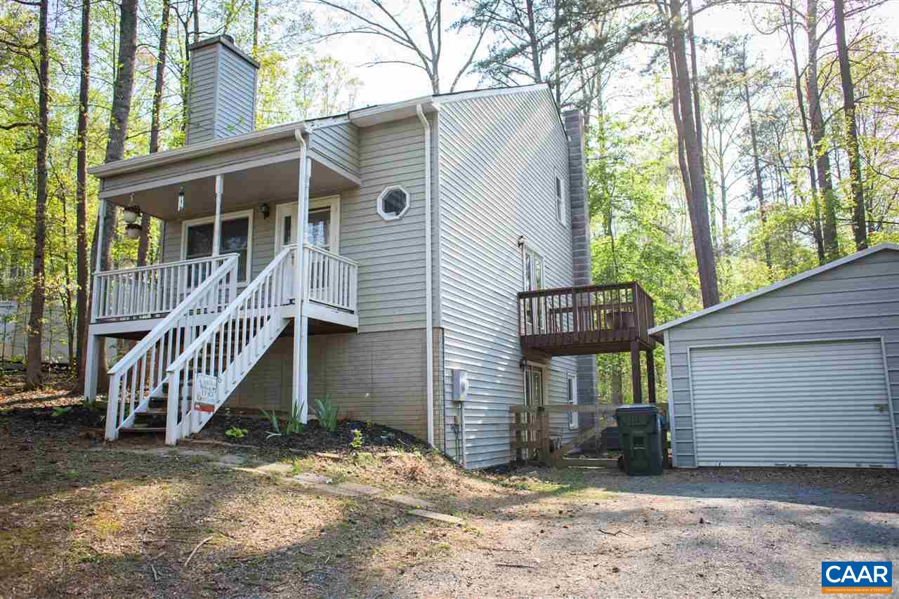 207 West Daffodil Road Ruckersville, VA 22968 - Photo 19 of 21 a view of a house with a yard and wooden deck
