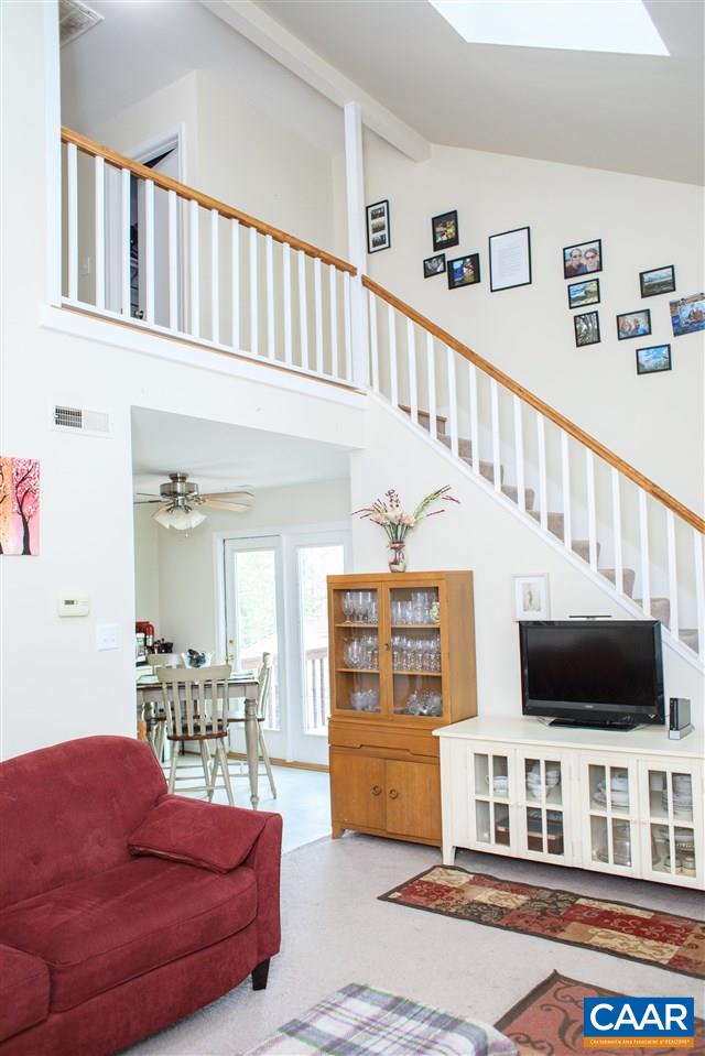 207 West Daffodil Road Ruckersville, VA 22968 - Photo 20 of 21 a living room with furniture and a flat screen tv