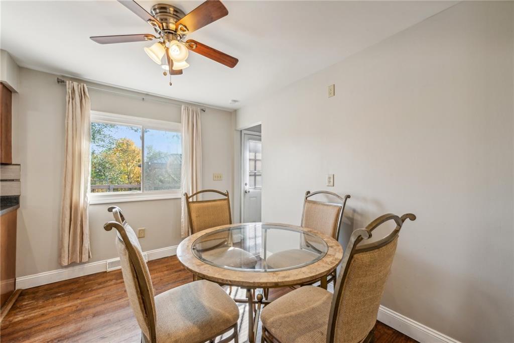 306 Highland Ridge Road Claysville, PA 15323 - Photo 15 of 37 a view of a dining room with furniture window and wooden floor