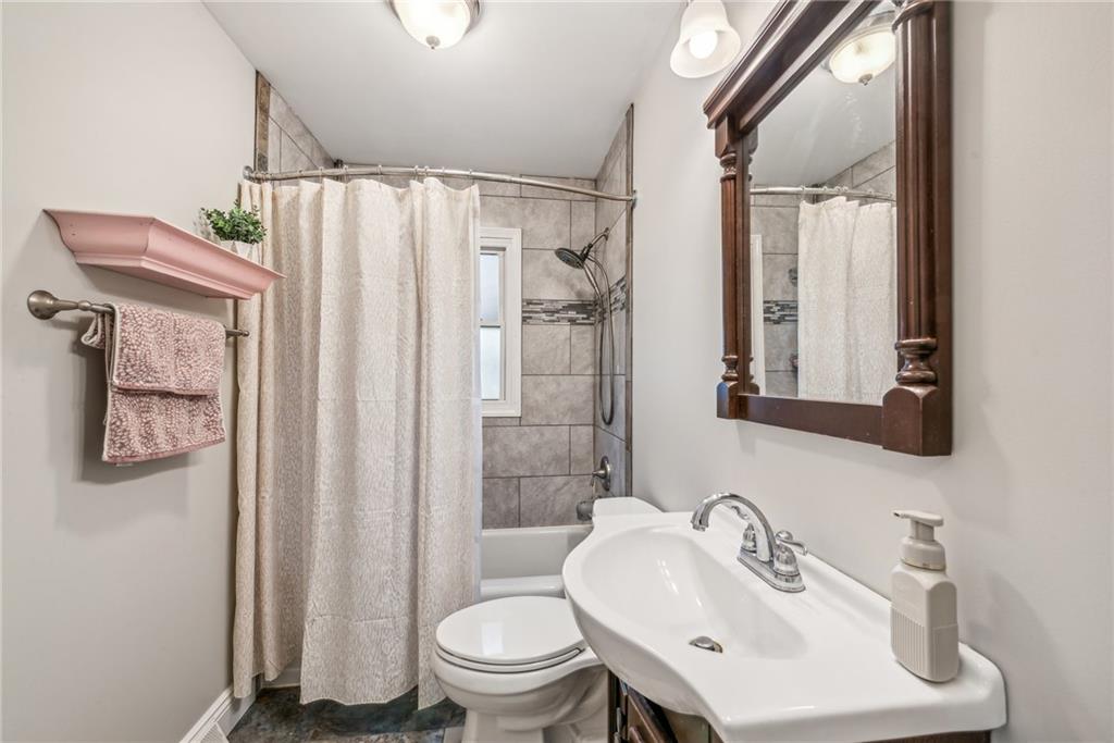 306 Highland Ridge Road Claysville, PA 15323 - Photo 22 of 37 a bathroom with a sink toilet and shower