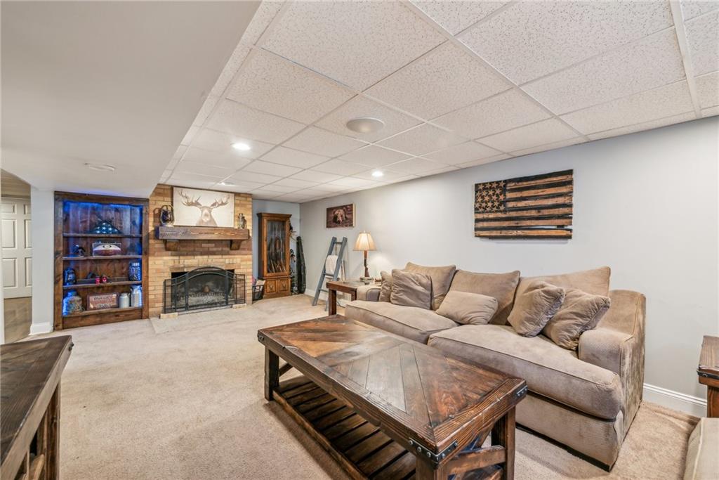 306 Highland Ridge Road Claysville, PA 15323 - Photo 24 of 37 a living room with furniture and a flat screen tv