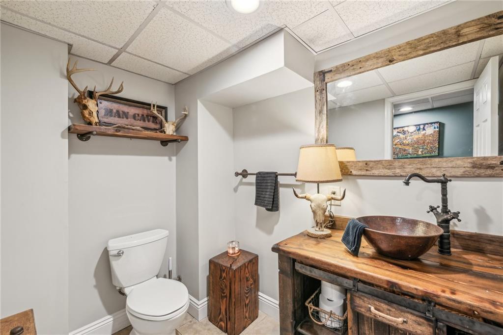 306 Highland Ridge Road Claysville, PA 15323 - Photo 29 of 37 a bathroom with a toilet a sink and mirror