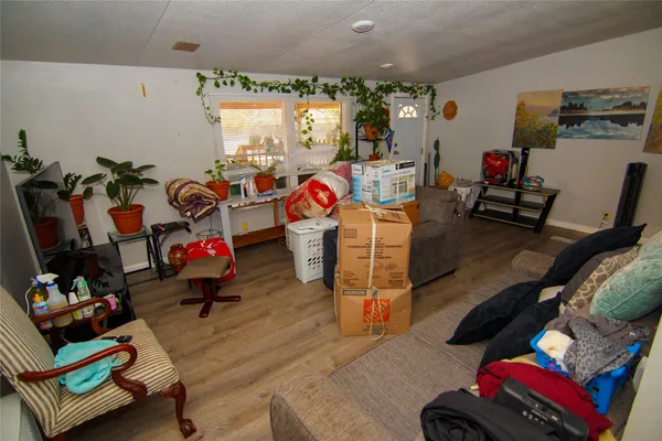 a room with gym equipment and a window
