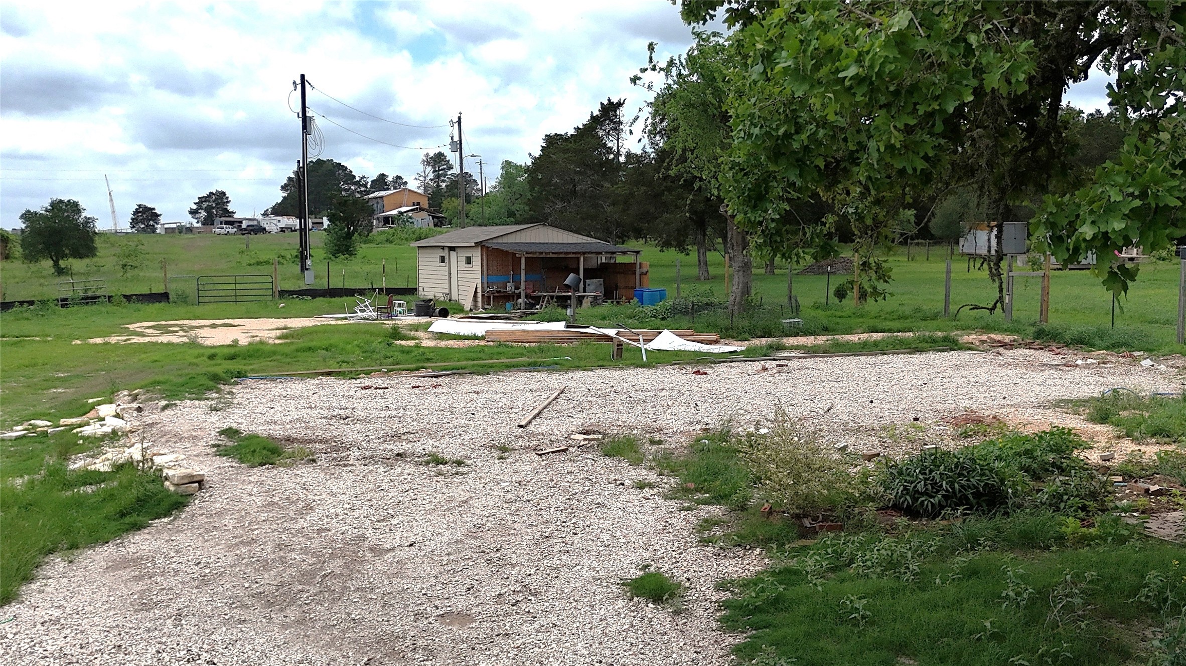155 Arbuckle Road Elgin, TX 78621 - Photo 18 of 35 a view of a house with a yard