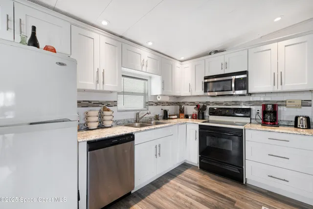 $189,000 | 209 Cobia Court, Barefoot Bay, FL 32976