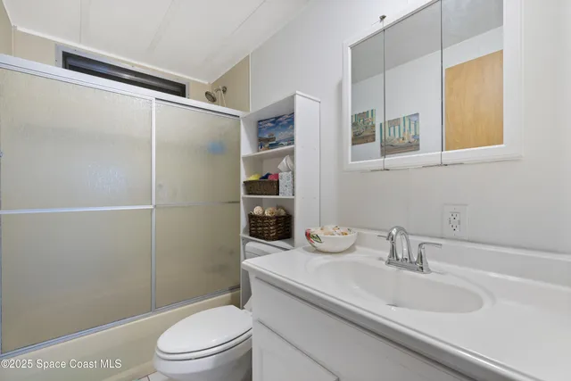 $189,000 | 209 Cobia Court, Barefoot Bay, FL 32976