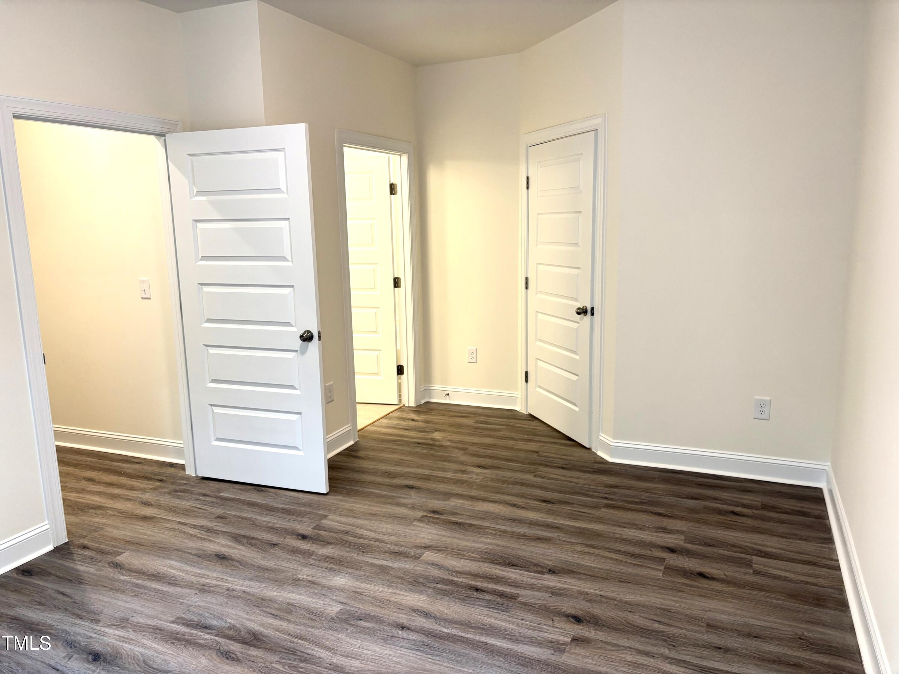 602 Weather Ridge Lane, Unit 21 Cary, NC 27513 - Photo 7 of 19 a view of wooden floor and closet in a room