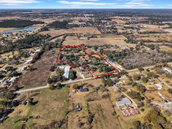 an aerial view of residential house with parking space