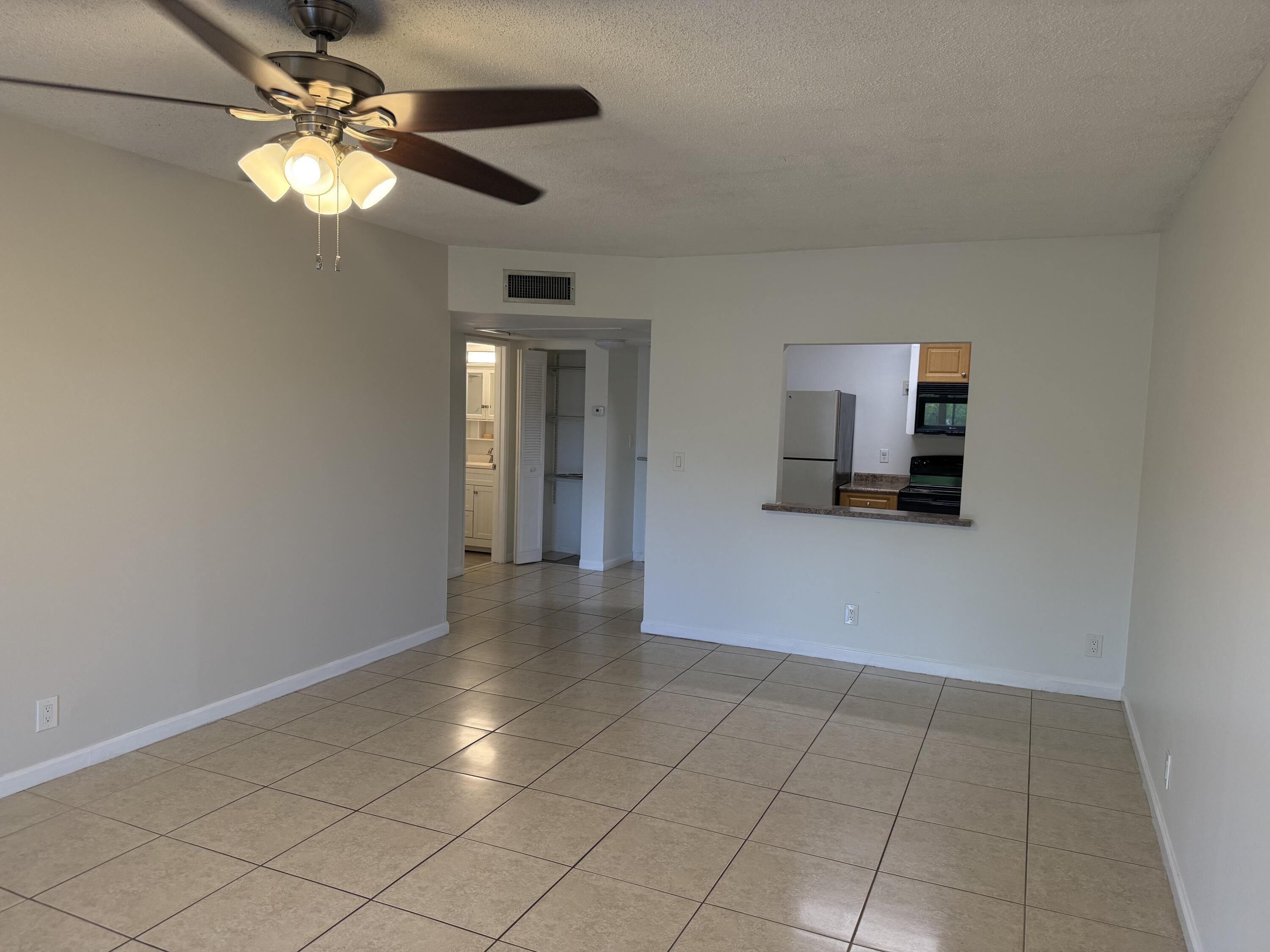 255 South Cypress Road, Unit 339 Pompano Beach, FL 33060 - Photo 5 of 14 Living/dining room