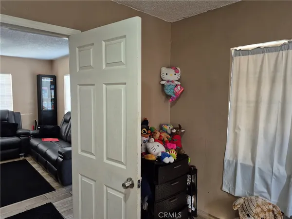 a view of a bedroom with a window