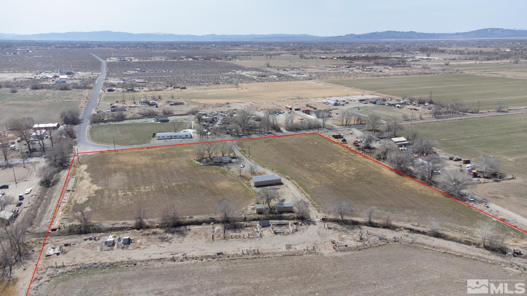 4100 Edwards Lane Fallon, NV 89406 - Photo 3 of 23 an aerial view of ocean and residential houses with outdoor space
