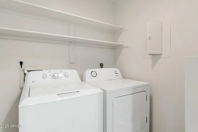 a utility room with dryer and washer