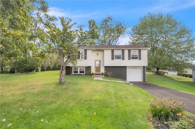 a house view with a garden space