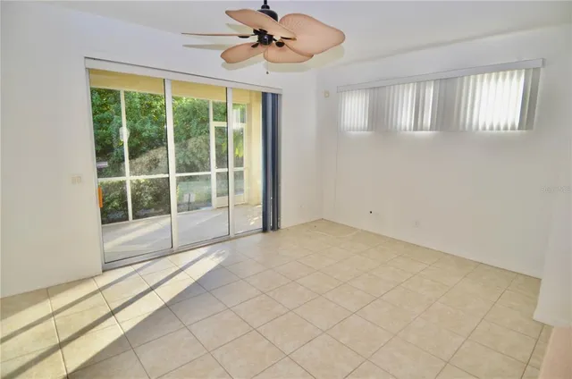 a view of empty room with windows