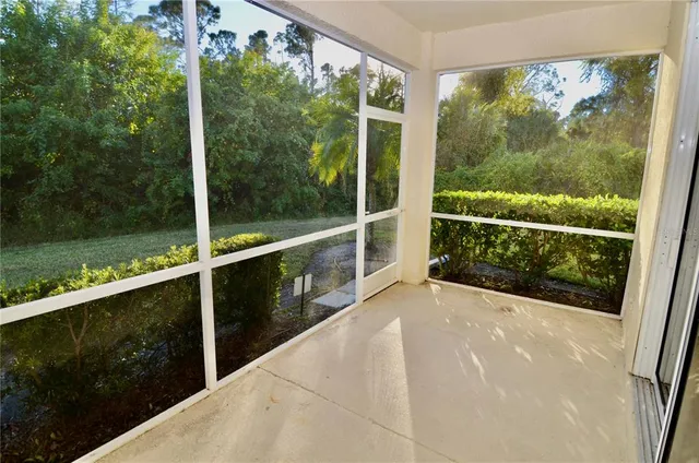 a view of balcony with yard