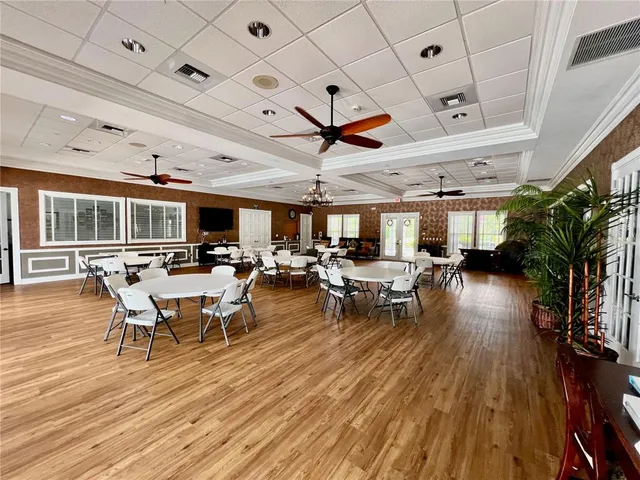a outdoor space with lots of furniture and wooden floors