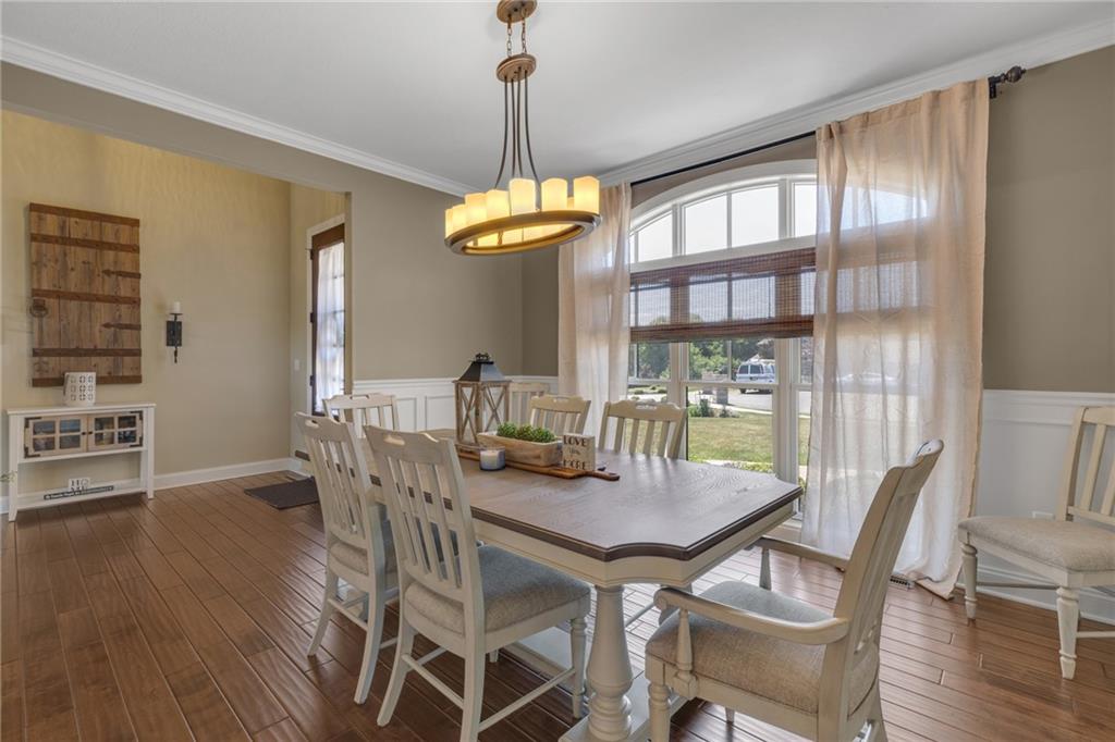 125 James Drive Beaver, PA 15009 - Photo 12 of 40 a dining room with furniture a chandelier and wooden floor