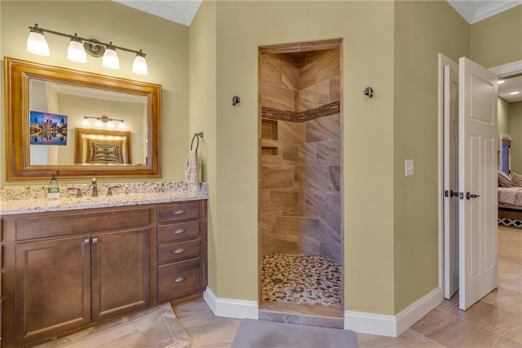 125 James Drive Beaver, PA 15009 - Photo 15 of 40 a bathroom with a granite countertop sink mirror and a shower