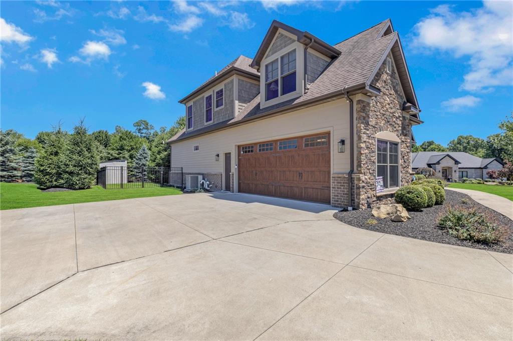 125 James Drive Beaver, PA 15009 - Photo 38 of 40 a front view of a house with a yard and garage