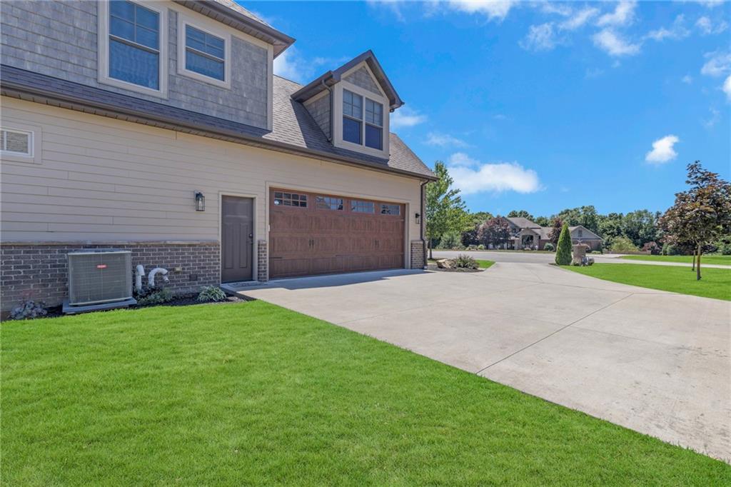 125 James Drive Beaver, PA 15009 - Photo 39 of 40 a front view of a house with a yard and garage