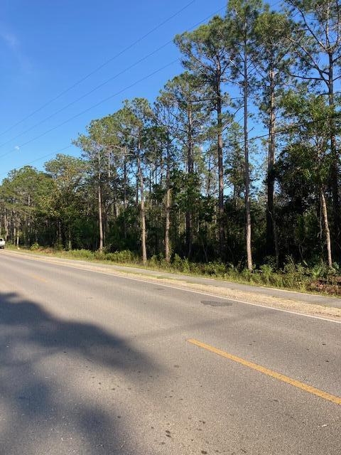 Tbd Churchill Bayou Road Santa Rosa Beach, FL 32459 - Photo 5 of 6 a view of street with a building in the background