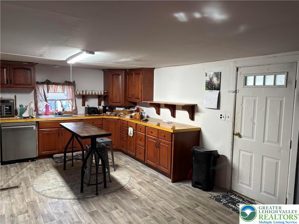 3 Tribe Lane Wind Gap, PA 18091 - Photo 2 of 6 a room with stainless steel appliances kitchen island granite countertop furniture and a refrigerator