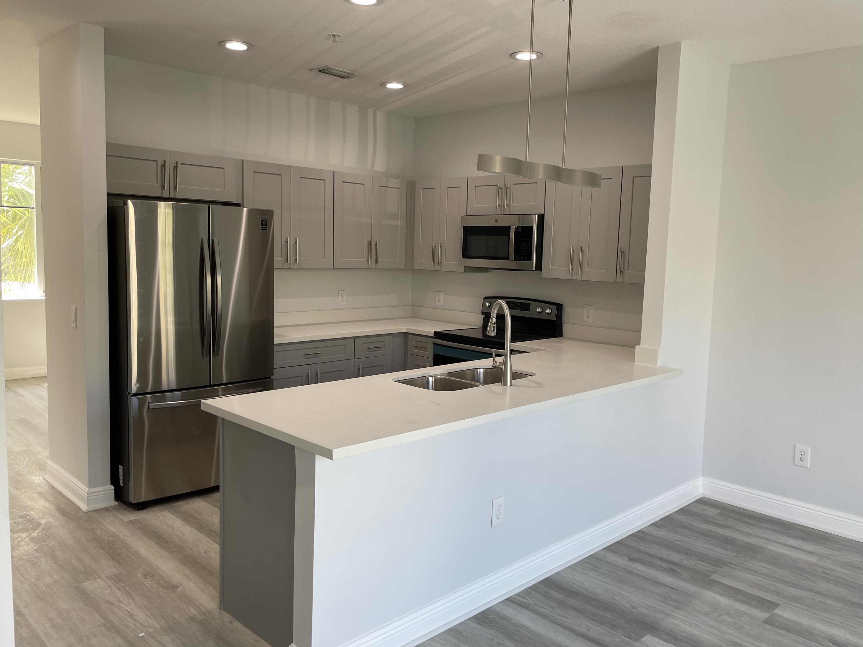543 Northwest 35th Place Boca Raton, FL 33431 - Photo 3 of 15 Photo Jul 24, 10 57 36 AM