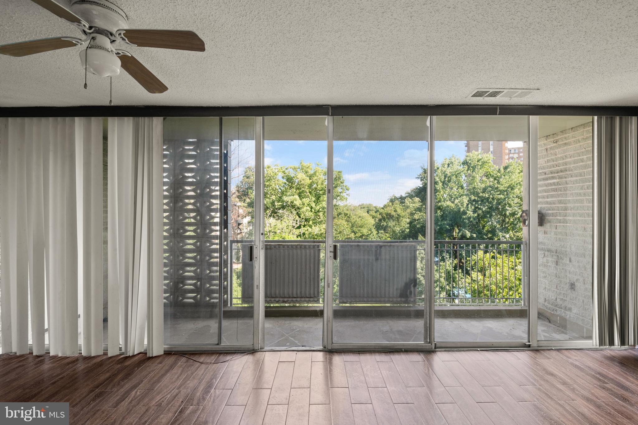 1824 Metzerott Road, Unit 303 Adelphi, MD 20783 - Photo 3 of 28 a view of a porch