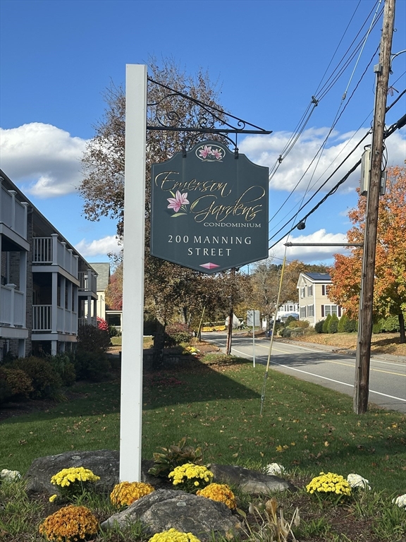 200 Manning Street, Unit 6C Hudson, MA 01749 - Photo 1 of 6 a view of a house with a yard