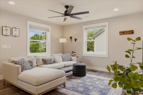 a living room with furniture and a window