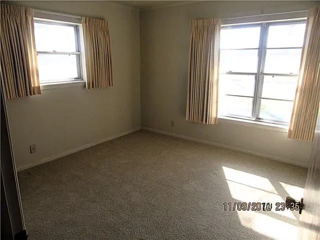 an empty room with a window