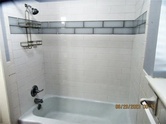 a bathroom with a bathtub