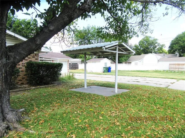a house view with a garden space