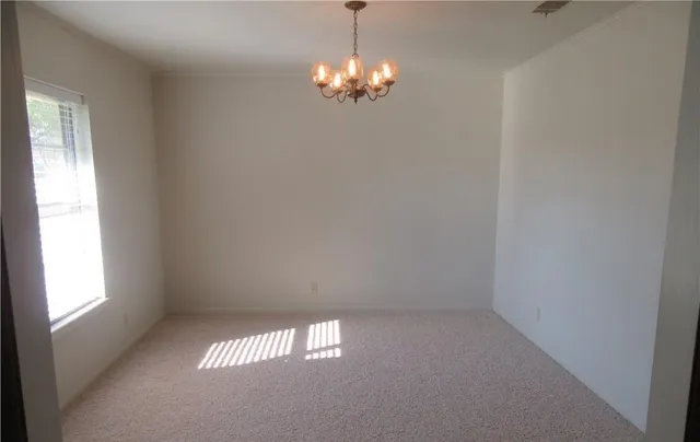 a view of empty room with window